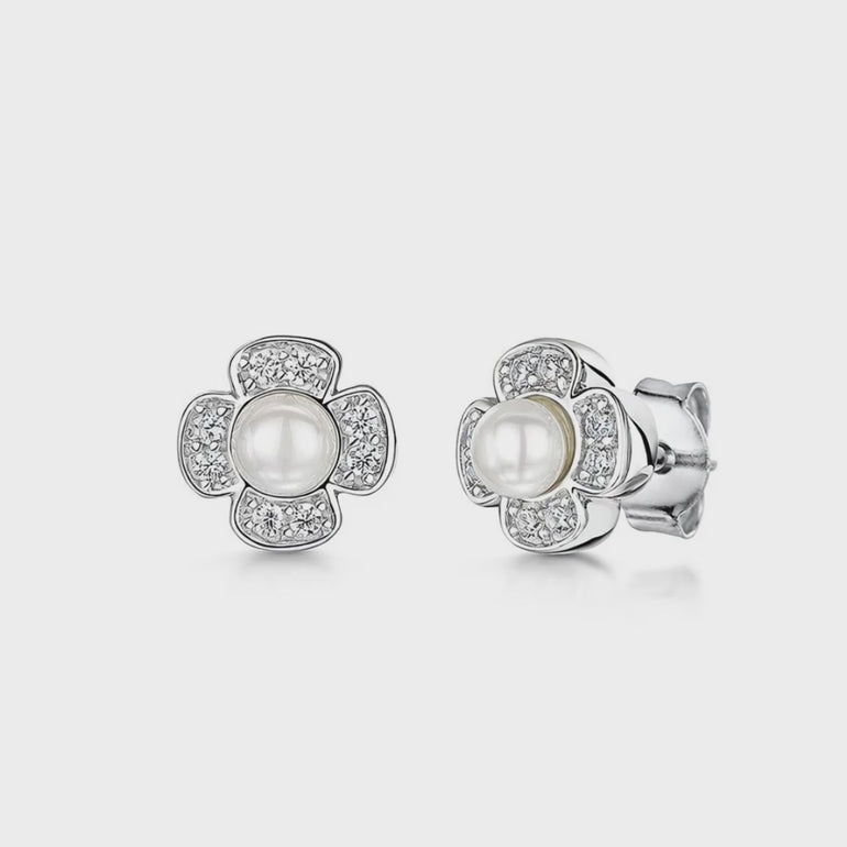 elegant stud earrings with central round pearl surrounded by a flower-shaped cluster of small clear stones - JOOLS By Jenny Brown - JOOLS By Jenny Brown