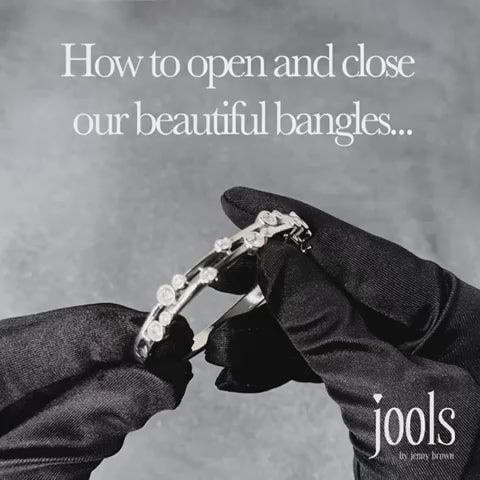 video showing opening nd closing of a JOOLS silver bubble bangle