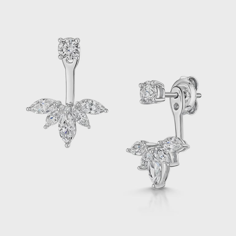 A pair of sterling silver cubic zirconia earrings in a lotus flower shape design, with a solitaire stud and marquise fan-JOOLS by Jenny Brown