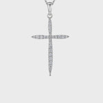 Load and play video in Gallery viewer, video clip of A sterling silver cross pendant encrusted with round white zirconia stones on a chain-JOOLS by Jenny Brown
