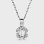 Load and play video in Gallery viewer, Sterling Silver And Pearl Necklace Set In A Four Petal Surround  - JOOLS By Jenny Brown
