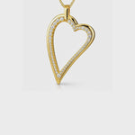 Load and play video in Gallery viewer, Yellow Gold Small Dali Heart Cubic Zirconia Pendant
