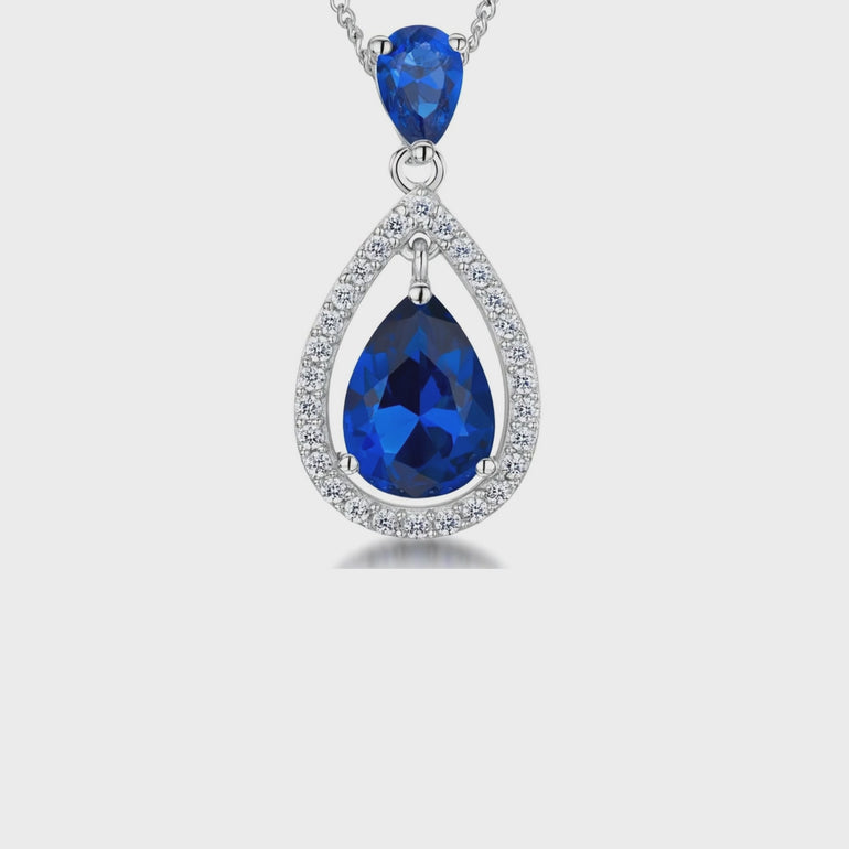 Sterling Silver Suspended Sapphire Blue Zirconia Halo Pendant- JOOLS by Jenny Brown