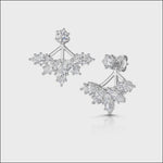 Load and play video in Gallery viewer, A pair of sterling silver jacket earrings featuring a lotus flower design with cubic zirconia stones, including a detachable solitaire stud earring.
