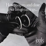 Load and play video in Gallery viewer, Sterling Silver Medium Hoop Earrings Set With Cubic Zirconia-JOOLS by Jenny Brown
