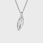 Load and play video in Gallery viewer, A sterling silver marquise shape pendant with a freshwater pearl on a silver chain- JOOLS by Jenny browns
