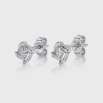 Load and play video in Gallery viewer, Sterling Silver Cubic Zirconia Stud Earrings With A Square Setting-JOOLS by Jenny Brown
