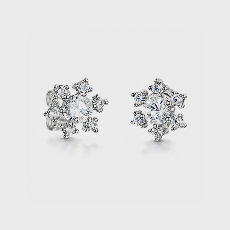 A pair of sterling silver snowflake earrings inset with cubic zirconia stones-JOOLS by Jenny Brown