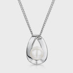 Load and play video in Gallery viewer, Sterling Silver And  Pearl Pendant In An  Open Loop Setting-JOOLS by Jenny Brown
