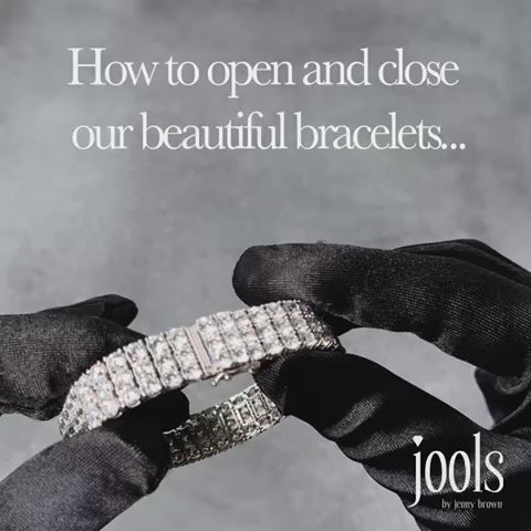 instruction video showing opening and closing of a JOOLS by Jenny Brown tennis bracelet, featuring a snap fastening- JOOLS By Jenny Brown 