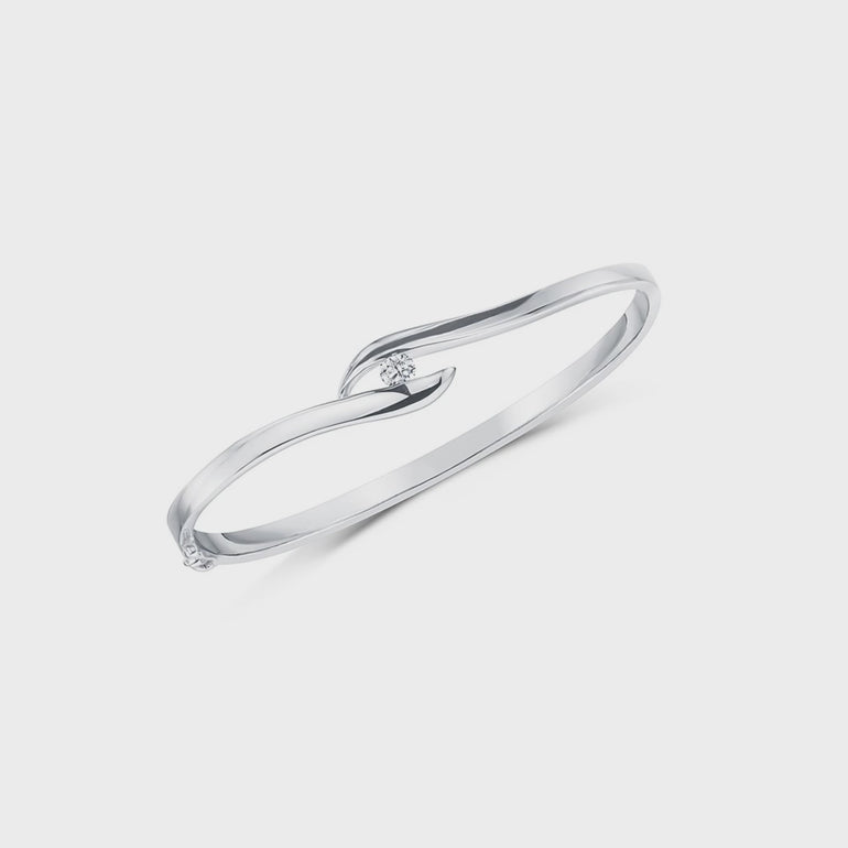 Sterling Silver Bangle  With A White Zirconia Stone Held Between the Two Silver Strands - JOOLS By Jenny Brown