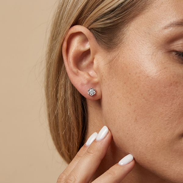 Sterling Silver Cutout Flower Stud Earrings