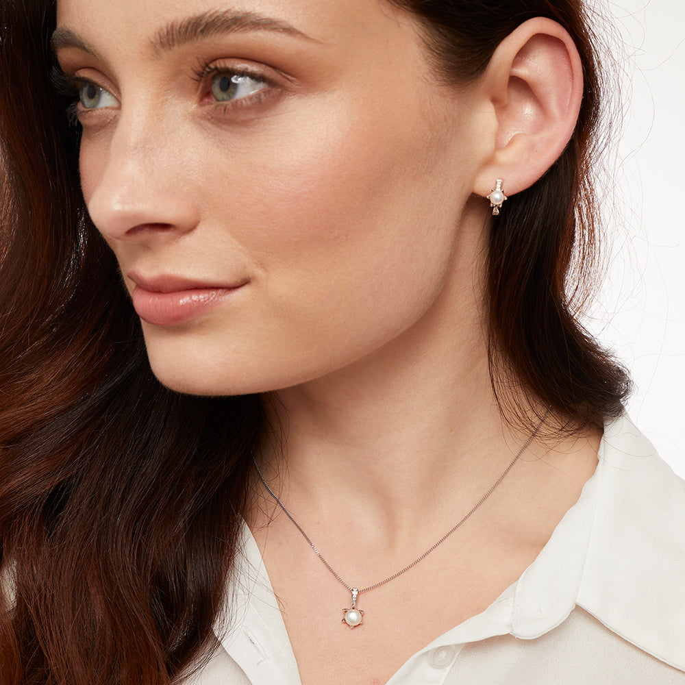 Sterling Silver And Pearl Huggie Hoop Earrings With A Star Shape Setting - JOOLS By Jenny Brown