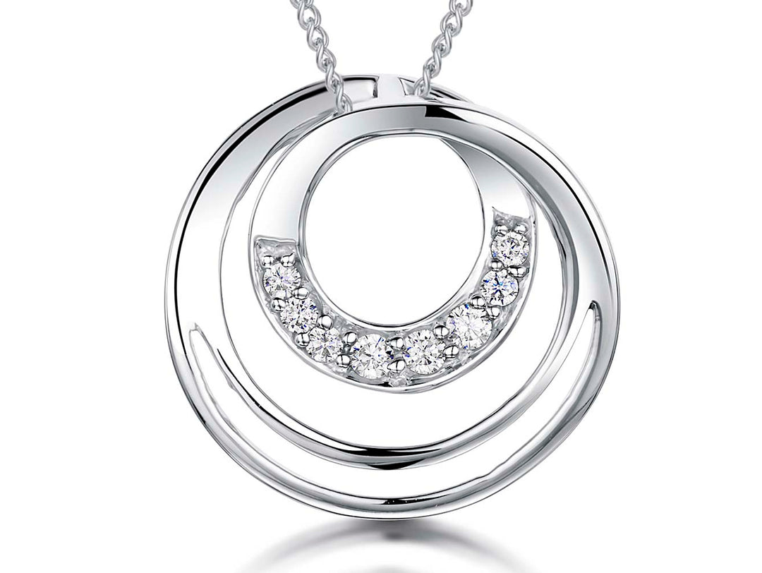 Sterling silver three circle pendant with cubic zirconia stones set in the inner circles, attached to a silver chain-JOOLS by Jenny Brown