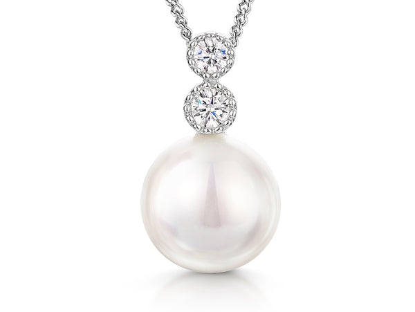 A sterling silver necklace with a 9mm freshwater pearl pendant and two white zirconia stones set above the pearl.
