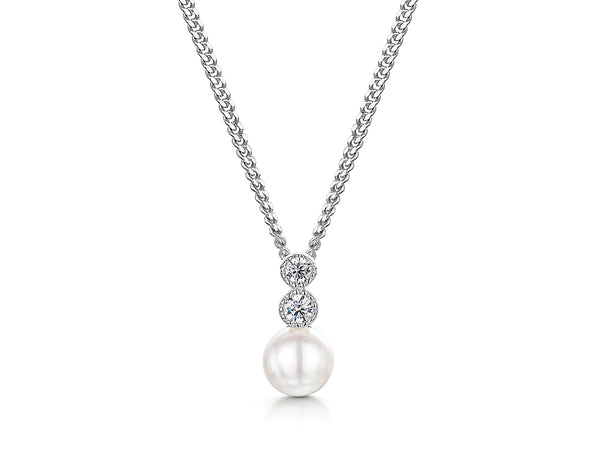 A sterling silver necklace with a freshwater pearl pendant and two white zirconia stones set in a rhodium finished chain-JOOLS by Jenny Brown