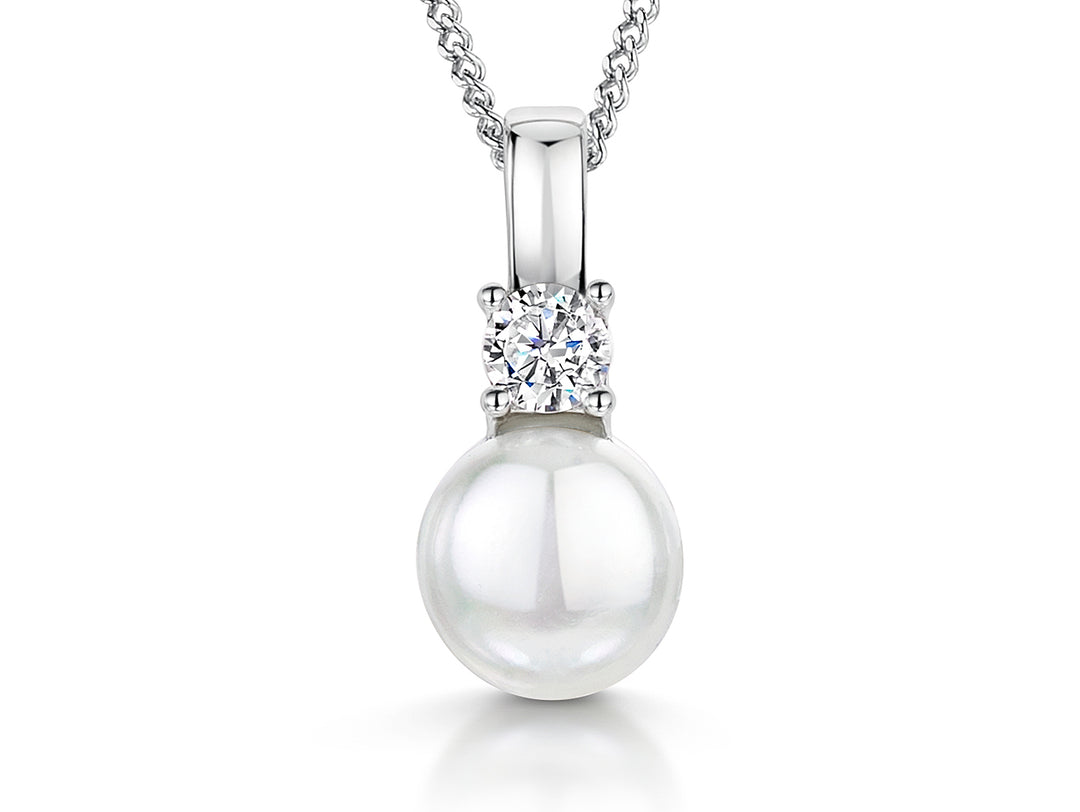 Sterling Silver Pearl Pendant Topped With A Cubic Zirconia