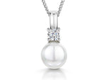 Load image into Gallery viewer, Sterling Silver Pearl Pendant Topped With A Cubic Zirconia
