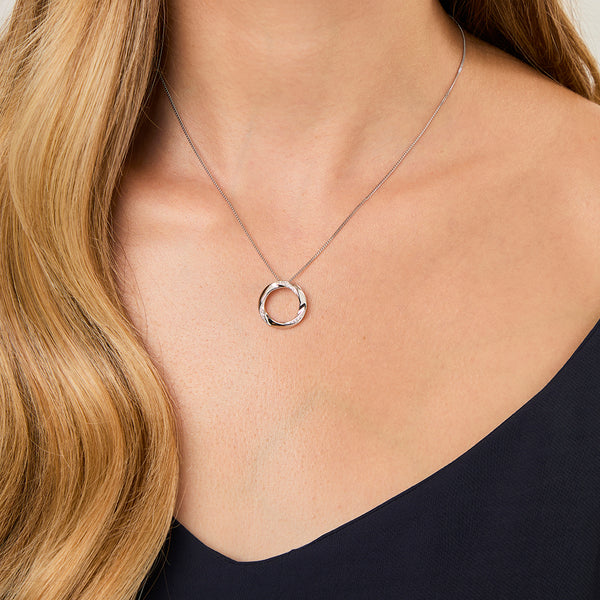 12mm twisted open circle pendant in sterling silver with pave-set cubic zirconia.