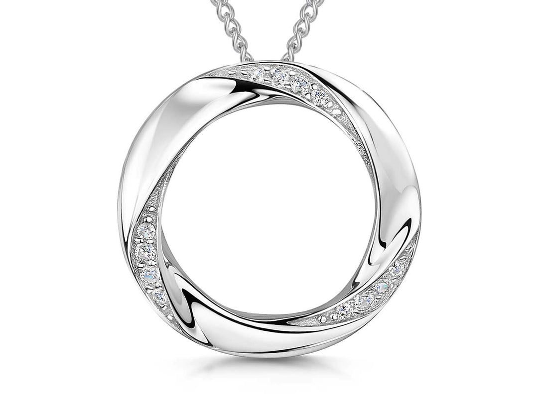 A sterling silver pave set open twisted circle pendant with cubic zirconia stones, attached to a chain-JOOLS by Jenny Brown