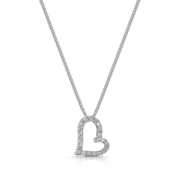 A sterling silver offset pave heart pendant with a cubic zirconia surround, set with small blue stones, on an adjustable chain-JOOLS by Jenny Brown