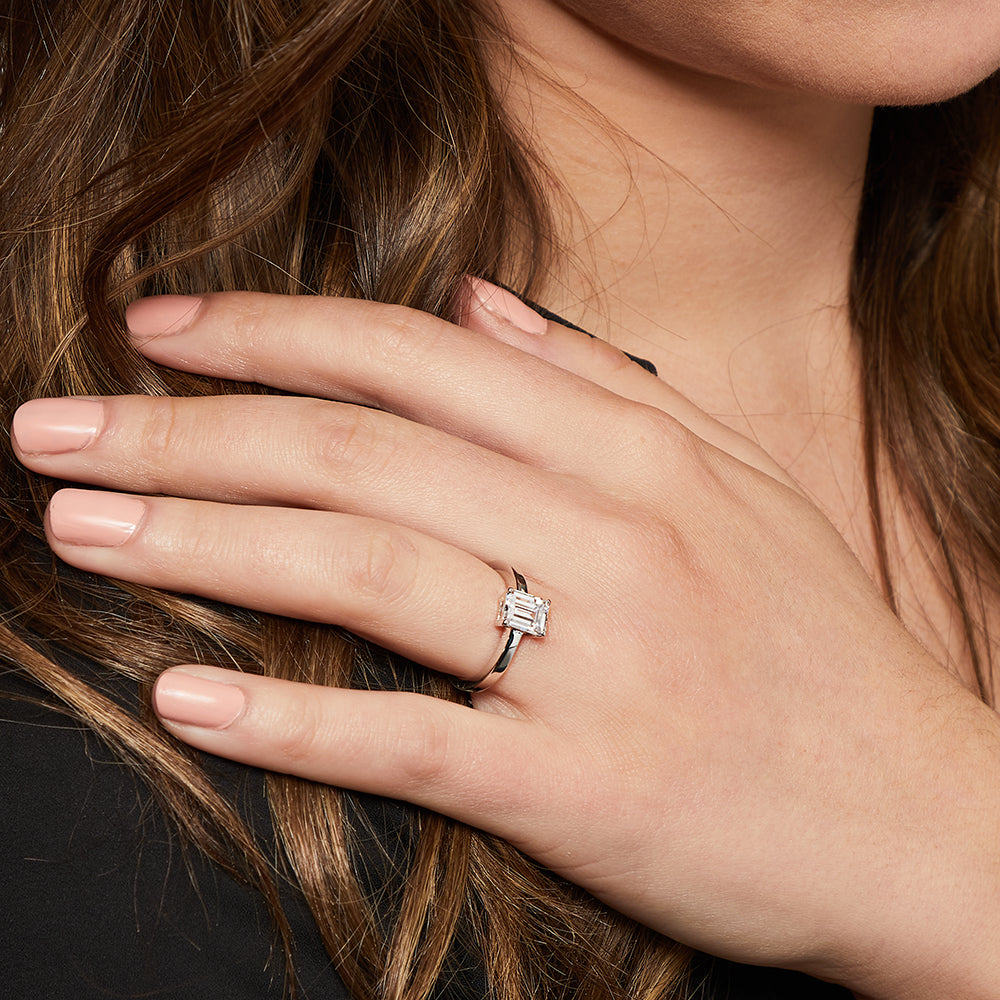 STERLING SILVER ONE AND A HALF CARAT EMERALD CUT SOLITAIRE RINGRings - JOOLS By Jenny Brown