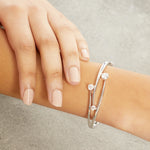 Load image into Gallery viewer, Sterling Silver Three Graduated Bangle With Cubic Zirconia Stones- JOOLS By Jenny Brown

