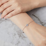 Load image into Gallery viewer, Sterling Silver and Cubic Zirconia Evil Eye Bracelet With A Blue Stone Centre- JOOLS by Jenny Brown
