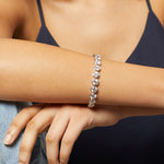 Load image into Gallery viewer, A sterling silver bracelet  with multiple cubic zirconia stones  totalling 24 Carats -JOOLS by Jenny Brown
