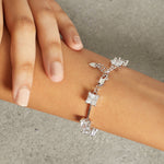 Load image into Gallery viewer, Sterling silver bar bracelet with princess cut cubic zirconia stones, featuring a chain extension.-JOOLS by Jenny Brown
