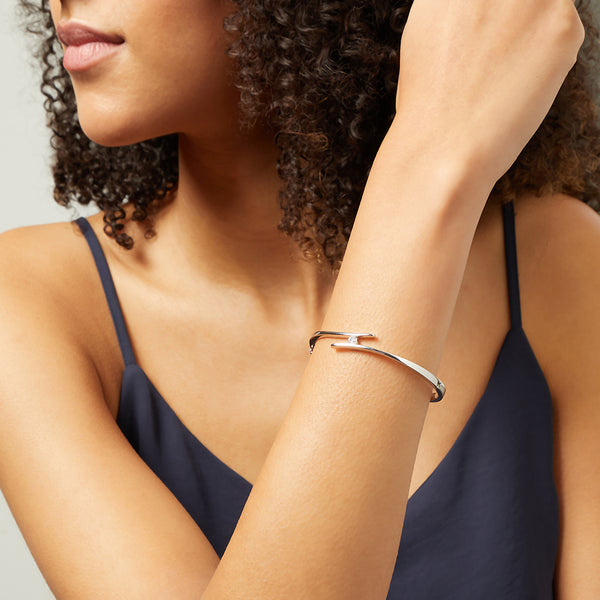 Sterling Silver Bangle Set With A Quarter Carat Round Brilliant Cubic Zirconia Stone JOOLS by Jenny Brown