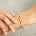 Load image into Gallery viewer, Sterling Silver Bangle Set With A Quarter Carat Round Brilliant Cubic Zirconia Stone JOOLS by Jenny Brown
