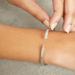 Load image into Gallery viewer, Sterling Silver Bangle Set With A Quarter Carat Round Brilliant Cubic Zirconia Stone JOOLS by Jenny Brown
