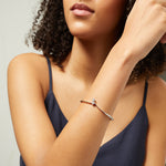 Load image into Gallery viewer, Sterling Silver And Double Crossover Cubic Zirconia Bangle JOOLS by Jenny Brown
