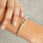 Load image into Gallery viewer, Sterling Silver Split Band Bracelet Set With A Single Cubic Zirconia Stone JOOLS by Jenny Brown
