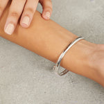 Load image into Gallery viewer, Sterling Silver Bangle Half Pave Set Eternity Style Set With Cubic Zirconia Stones Bracelets - JOOLS By Jenny Brown
