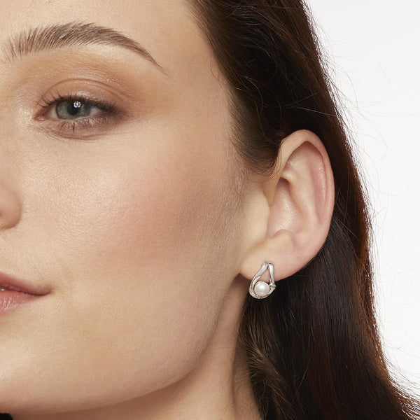 STERLING SILVER AND  PEARL EARRINGS IN AN OPEN LOOP SETTING Earrings - JOOLS By Jenny Brown