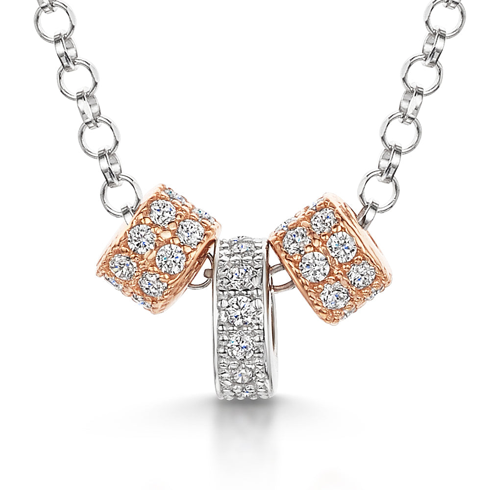 Sterling Silver Necklace With Three Rose Gold And Silver Rings Set With White Cubic Zirconia Stones