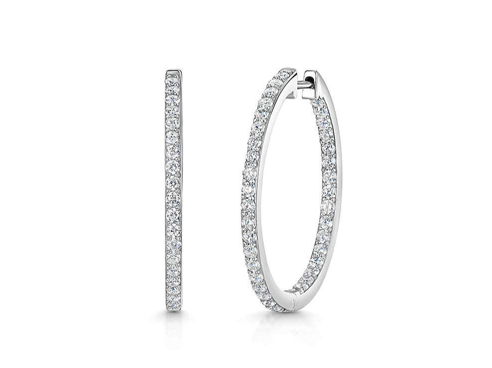 A pair of medium-sized  sterling silver hoop earrings set with cubic zirconia's-JOOLS by Jenny Brown
