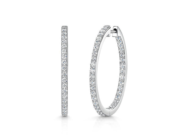 A pair of medium-sized  sterling silver hoop earrings set with cubic zirconia's-JOOLS by Jenny Brown