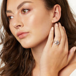 Load image into Gallery viewer, Solid 925 sterling silver statement cluster ring with round white cubic zirconia stones in bubble bezel settings.
