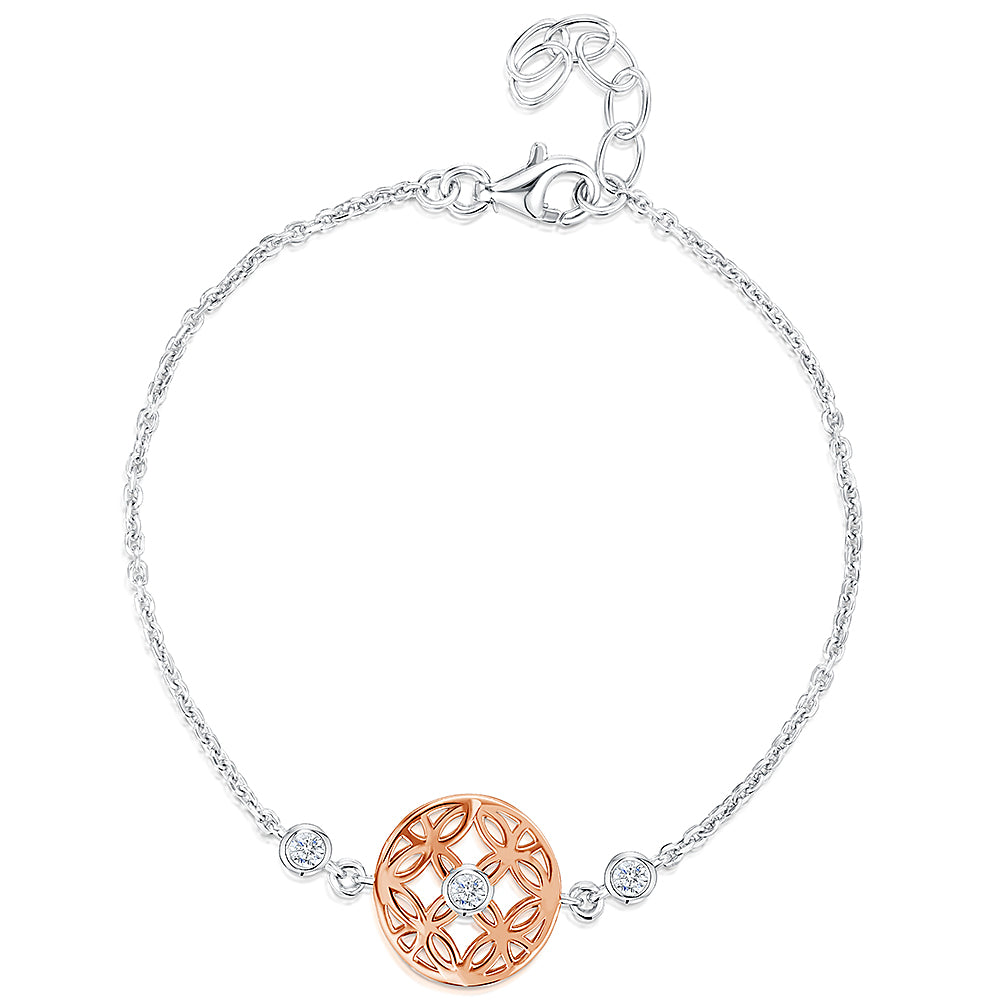 A sterling silver chain bracelet with a rose gold round charm and cubic zirconia stones, featuring a Hypoallergenic 925 silver build with a platinum finish.