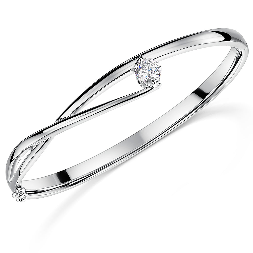 Sterling Silver Twist Bangle With A 1 Carat Tension Set Cubic Zirconia JOOLS by Jenny Brown