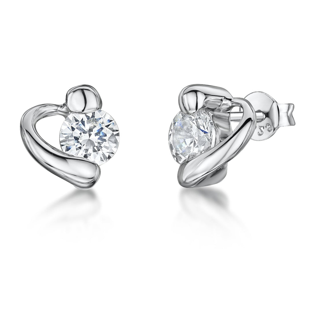 Sterling Silver Offset Heart Stud Earrings Set With A  Quarter Carat Cubic Zirconia - JOOLS By Jenny Brown