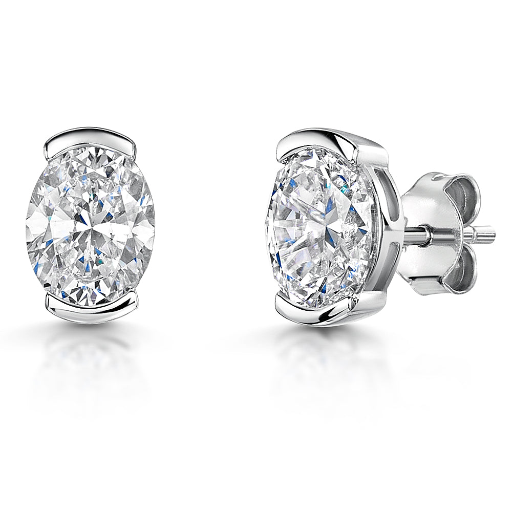 Sterling Silver Stud Earrings With Oval Shaped Cubic Zirconia