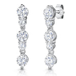 Load image into Gallery viewer, Sterling Silver Five Stone Drop Earrings  Set With Brilliant  Round Cut  Cubic Zirconia Stones - JOOLS By Jenny Brown
