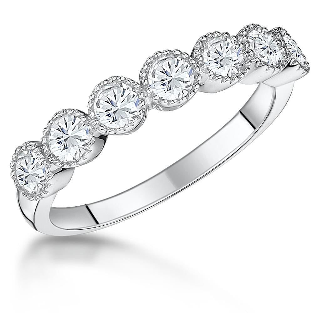 A sterling silver half hoop ring with cubic zirconia stones set in a beaded pattern-JOOLS by Jenny Brown