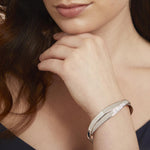 Load image into Gallery viewer, Sterling Silver Overlapping  Bangle Half Plain Silver Half Cubic Zirconia Stone SetBangles - JOOLS By Jenny Brown
