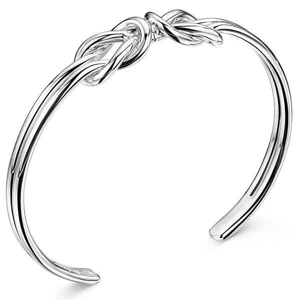 A sterling silver double knot cuff bangle with a high polished finish.