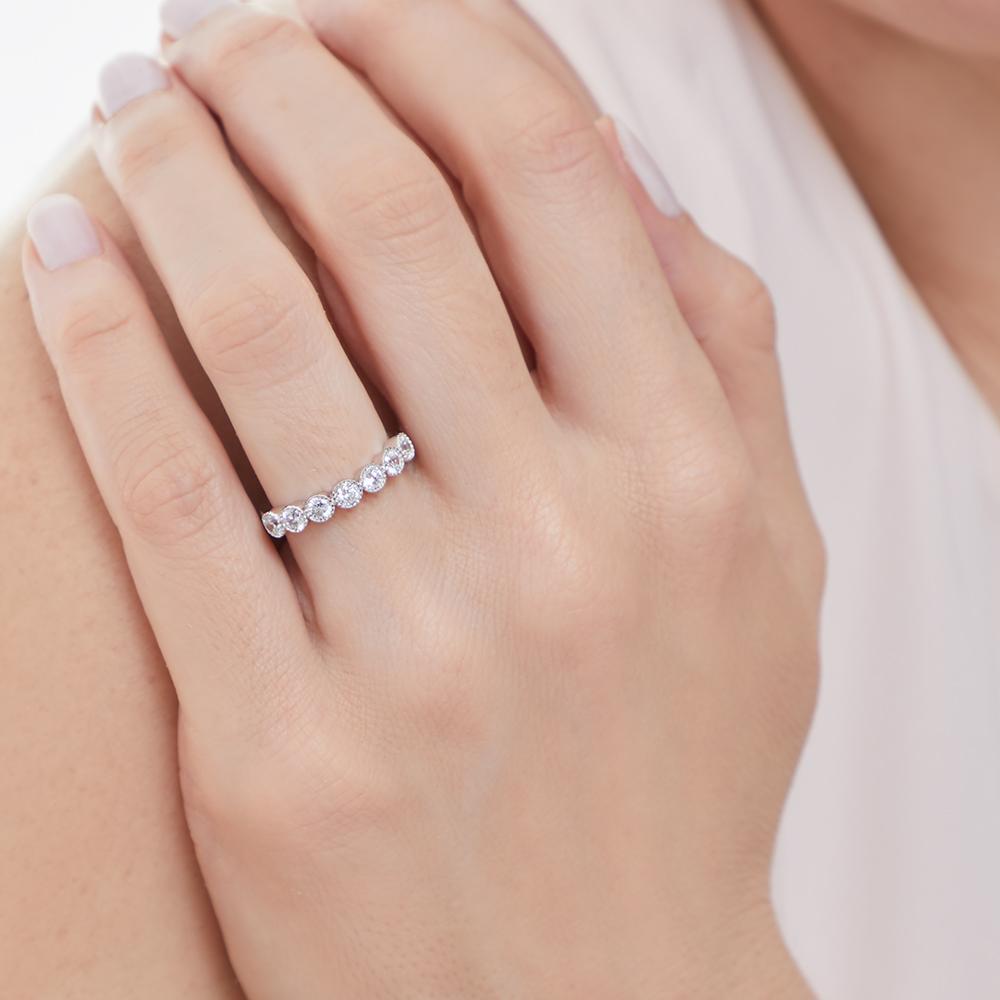 A sterling silver half hoop ring with cubic zirconia stones set in a beaded pattern-JOOLS by Jenny Brown